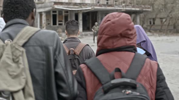 Group of Arab Refugees Walking