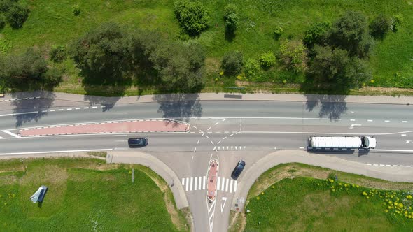 Static Top Down Aerial View of Countryside Road Traffic and Intersection on Sunny Summer Day, High A