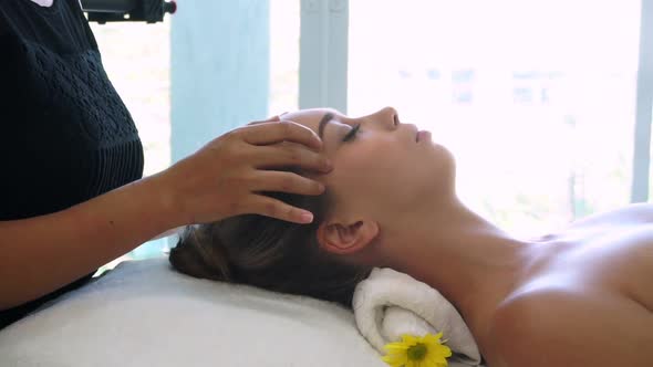 Woman Gets Facial and Head Massage in Luxury Spa