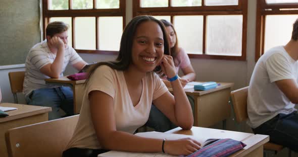 Teenagers in a school classroom alt