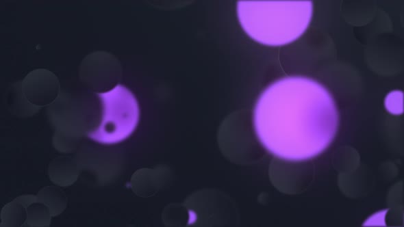 Flashing particles on black background