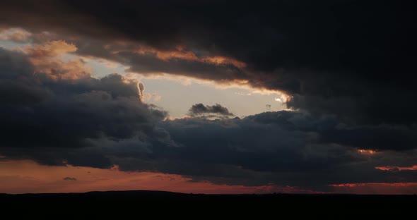 Gloomy Clouds At Sunset, Stormy. Timelapse
