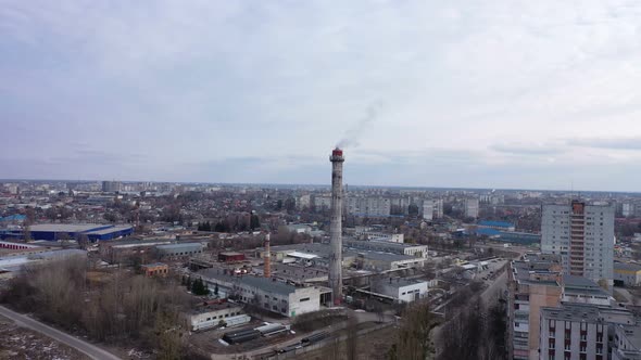 Flight In The Industrial District Of The City