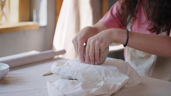 Woman is Making Clay Pot By Hands Closeup in Artistic Studio