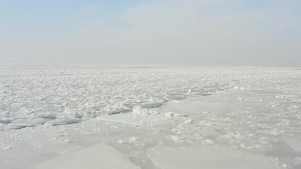 Slow Drone Flight Over Floating Ice in a Strait Among Ice Fields