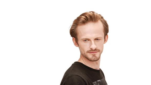 Young Handsome Man Smiling Passing By Over White Background