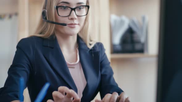 Call Center Employee at Work in the Office