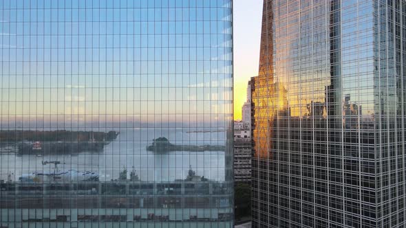 Buenos Aires city glass skyscrapers drone ascending close up to the buildings with famous Pureto Mad