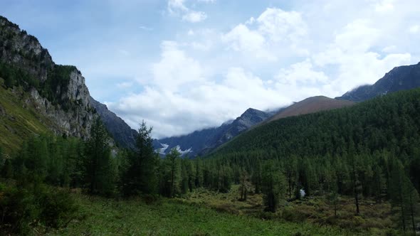 Сlouds in a Mountain Green Hollow