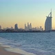 Burj Al Arab in Jumeirah Island or boat building with waves on sea beach, Dubai Downtown - VideoHive Item for Sale