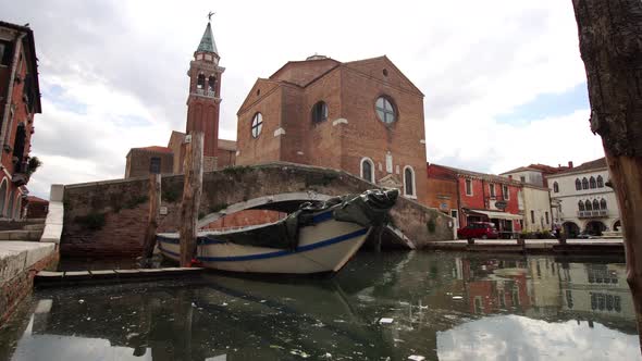 Wooden Boat on the Water of the Venetian City Chioggia