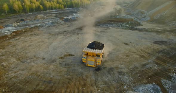 Yellow Tipper Truck Unfolds To Unload