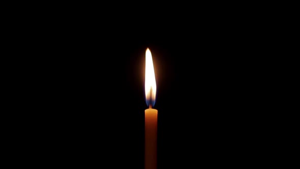 Candle Flame On A Black Background alt