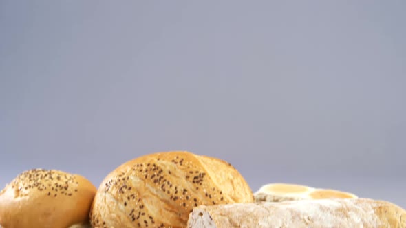 Various bread loaves with knife