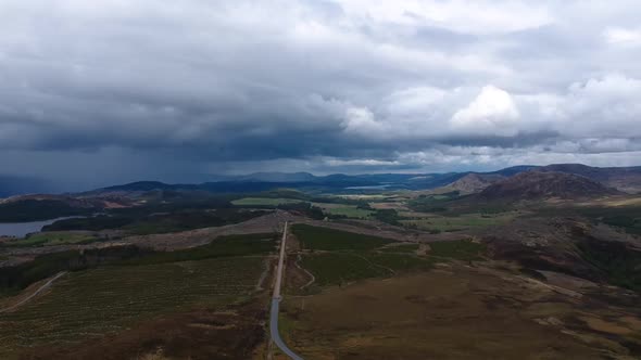 Panning droneshot of scottish highland landscape