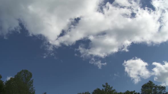 A eye soothing view of blue and clear sky with cotton clouds