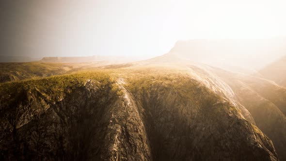 Dry Yellow Grass on the Rocky Mountain with Heavy Fog