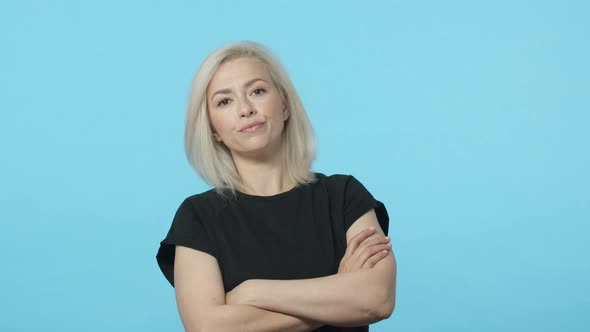 Skeptical and Pissedoff Annoyed Blond Woman Waiting Too Long for Person Showup Cross Hands Over