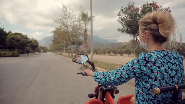 Adventure Freedom Trip. Discovering New Route. Woman In Dress Riding On Scooter. Ride On Motorcycle.