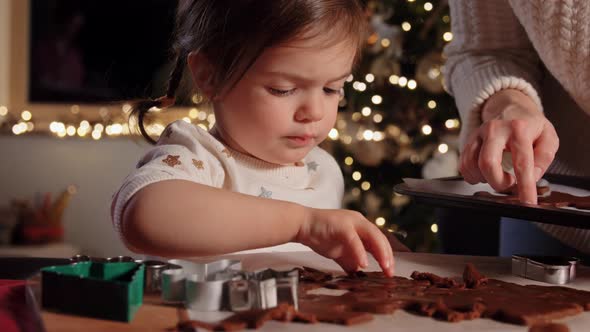 Mother and Daughter Making Gingerbread at Home