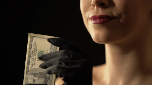 Greedy Woman Showing Dollars Into Camera, Jackpot or Lottery Winner, Casino