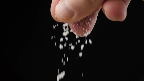 Chef adds salt to the dish, cooking in slow motion, cooking food