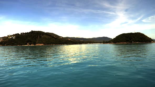 Looking at the sea, island and sky from the sea. (Slow motion - Angle 013)