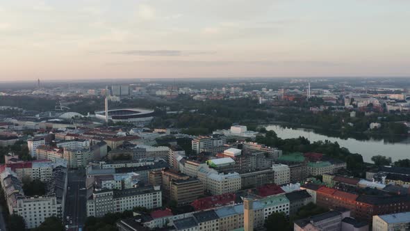 Aerial hover over Helsinki with stadium and colorful buildings