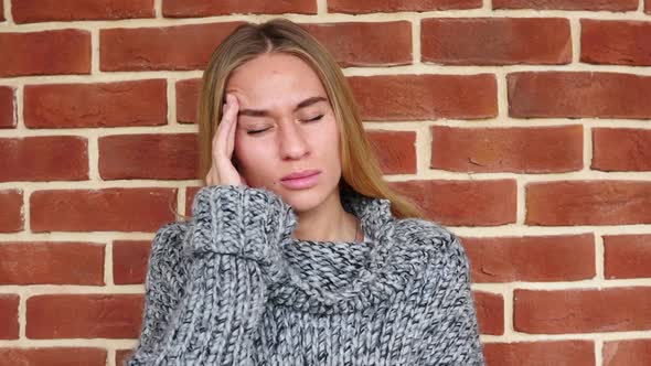 Headache Upset Tense Woman in Loft Office