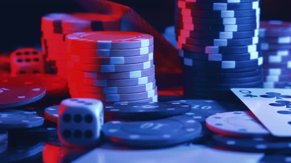 Casino Chips and Playing Cards in Motion