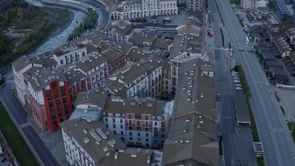 Aerial View Flock White Doves Fly Over Premium Apartment Building