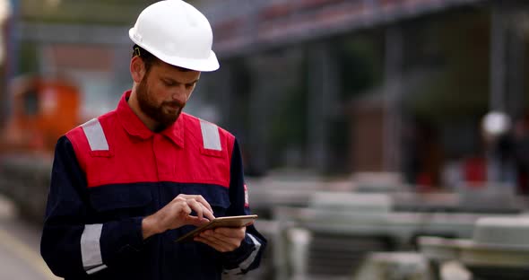 Construction Engineer Using Tablet