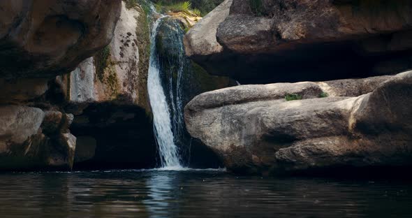 Beautiful Waterfall on Mountain River at the Forest