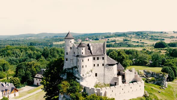 Morning aerial view on the medieval royal castle Bobolice. Poland. High quality 4k footage. Dolly zo