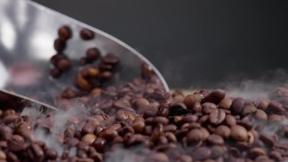 Ladle Scooping Up Coffee Beans Close Up