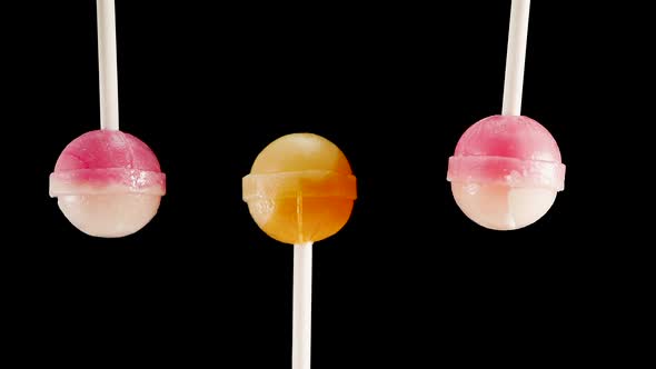 Baby Sweets Lollipops. A Lot Of Colorful Candies Are Spinning
