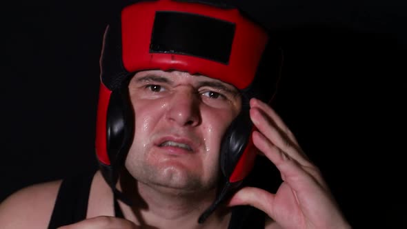 Angry Male Boxer on a Black Background