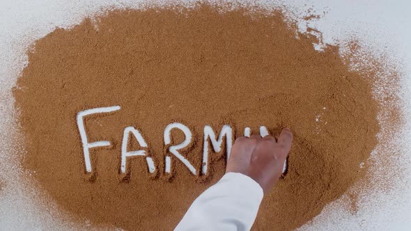 Hand Writes On Soil  Farming