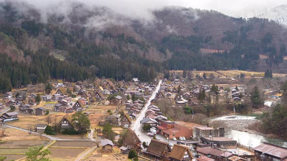 Time lapse of Traditional cottage houses in Shirakawago village with mountain hills