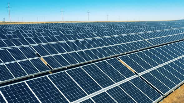 Aerial View of Rows of Solar Panels in a Solar Park