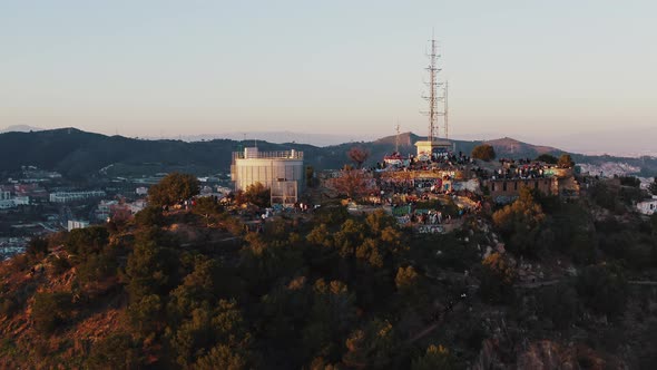 Visitors Enjoy Panorama of Barcelona From Turo De La Rovira