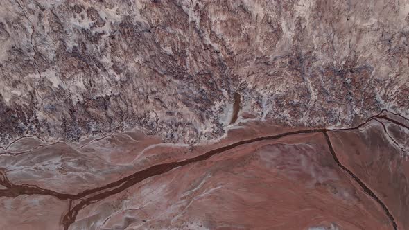 Aerial Photography of the Approaching Stream and the Foot of the Hill