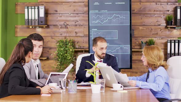 Corporate Business Meeting in Modern Meeting Room