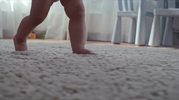 Teaching Baby to Make First Steps