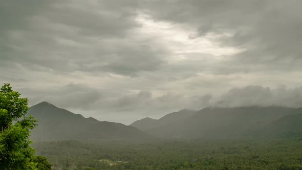 Dark Storm Clouds Over Tropical Mountains