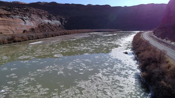 Flying over the Colorado River as broken ice floats down the river