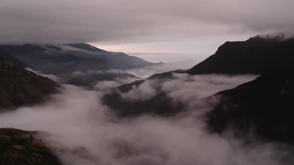 clouds at El cajas national park, at the Ecuadorian andes mountains. in the background the cost. sh