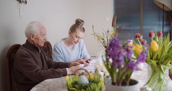 Happy Easter - Woman and Senior Man Talking During Easter Holidays