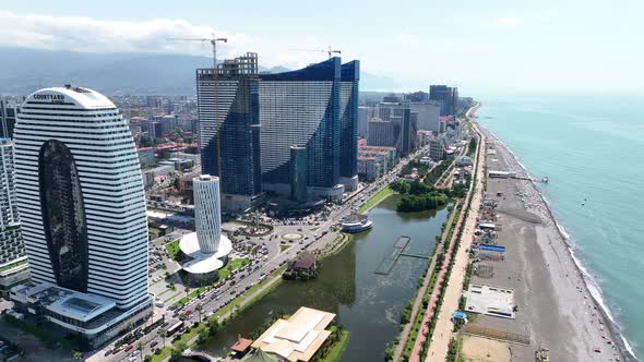 Batumi, Georgia - May 25 2022: Drone flies along new Batumi boulevard