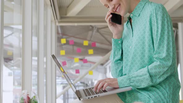 Young woman working in a creative office